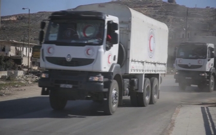 UN says aid trucks reach several besieged towns in Syria